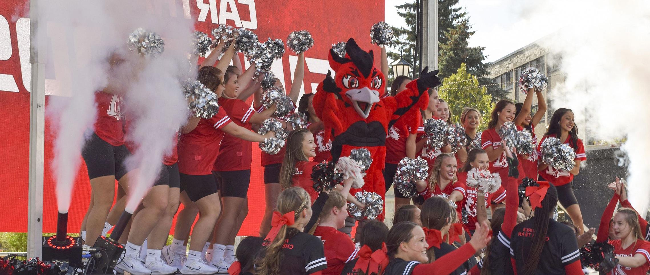 The Carthage College spirit team reveals Ember, the new Firebirds mascot, during Homecoming Weekend 2021.